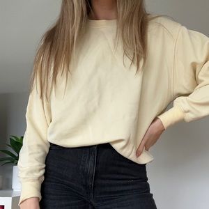 TNA yellow crew neck sweater